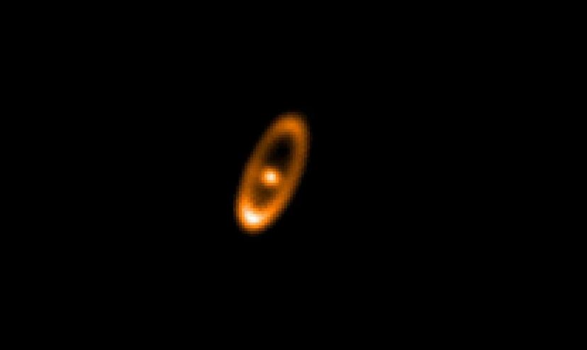 A PACS 70 micron image of the debris disk around Fomalhaut. The debris disk is well resolved. This is one of the few cases where Herschel also detects a hot star as, at 16 light years distance, Fomalhaut is close enough to be strongly detected at short wavelengths.